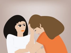 Two women in a conversation about mental health challenges
